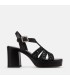 Sandalia de plataforma fabricada en piel negro con detalle trenzado